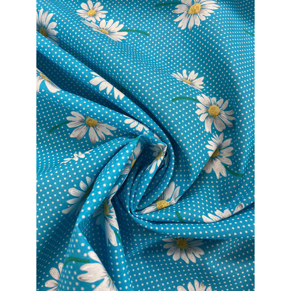 Blue Cotton fabric with white dots and daisy print